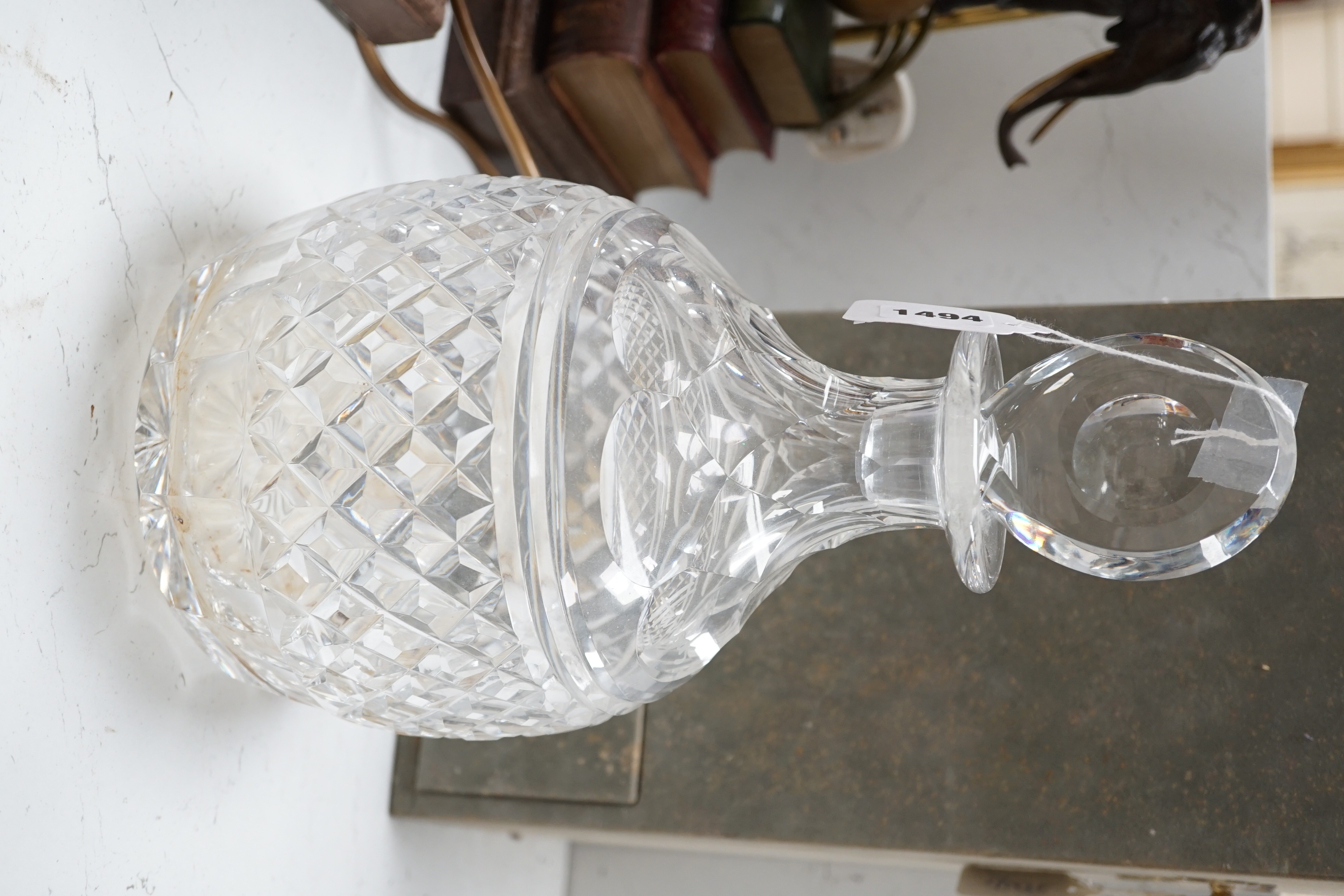 A Harrods cut glass decanter in original case, decanter and stopper, 33cms high